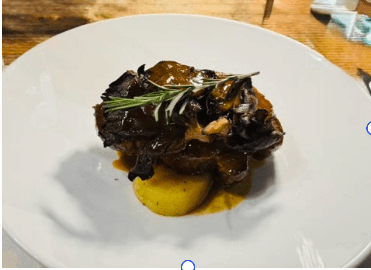 Braised Pork Neck over Mushrooms and&nbsp;Potatoes